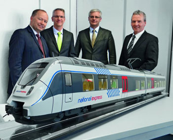 (from left) Tobias Richter, Managing Director, National Express Rail GmbH; Volker Kregelin, Vice President Business Development, Bombardier Transportation; Norbert Hübner, Sales Manager, Bombardier Transportation; Wolfgang Schuster, General Manager, National Express Rail GmbH